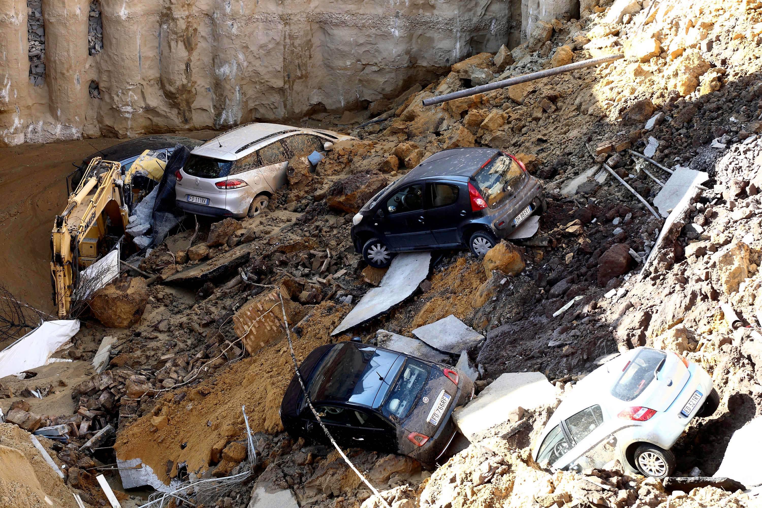 Giant Sinkhole Swallows Cars In Rome