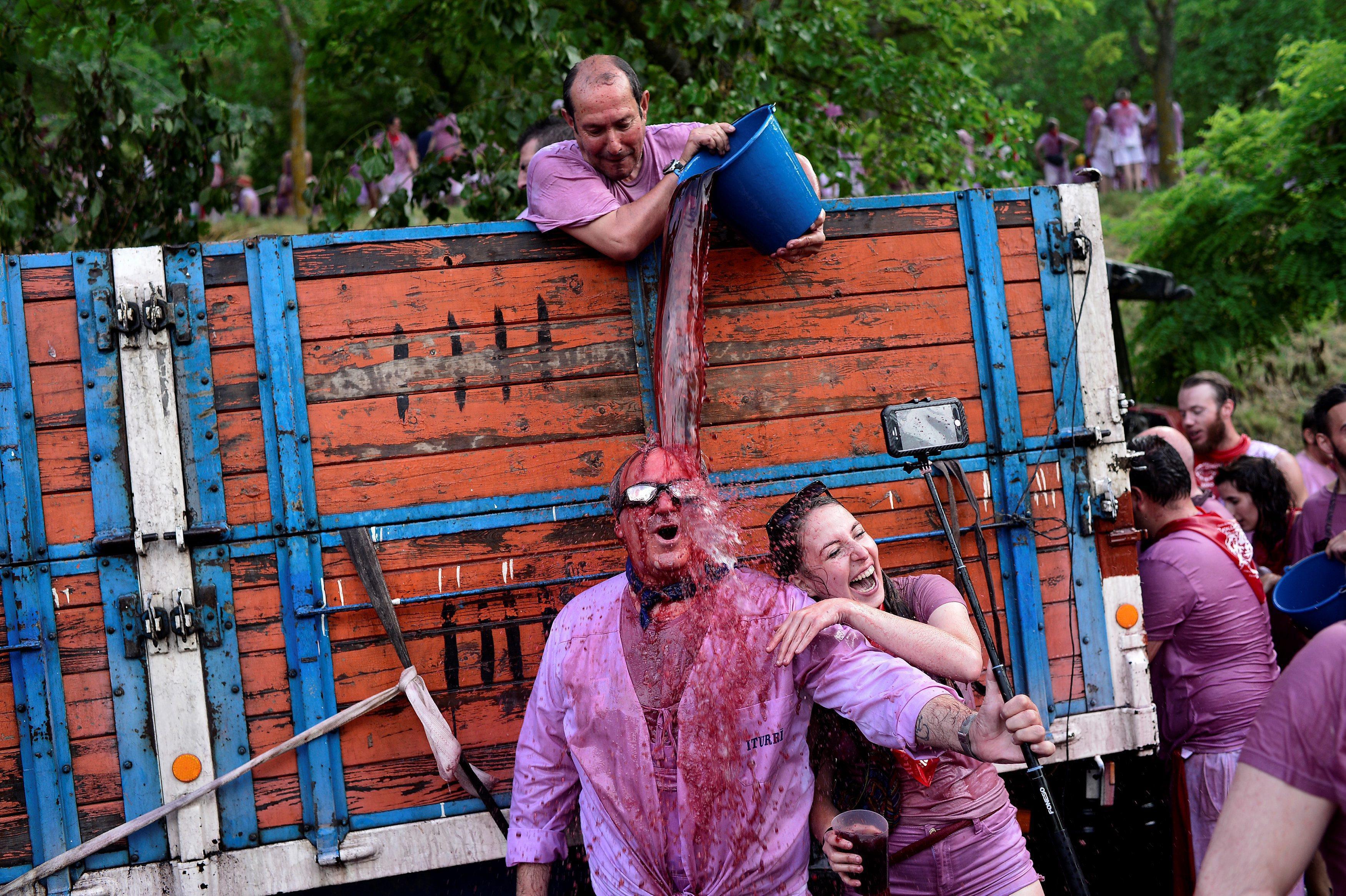 Revellers have wine poured over them during the Batalla de Vino (Wine Battle) in Haro