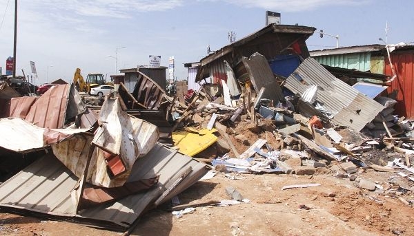 Krowor Assembly demolishes illegal structures to make way for road construction