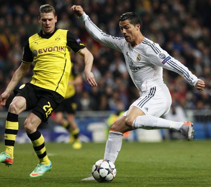 Łukasz Piszczek (z lewej) i Cristiano Ronaldo