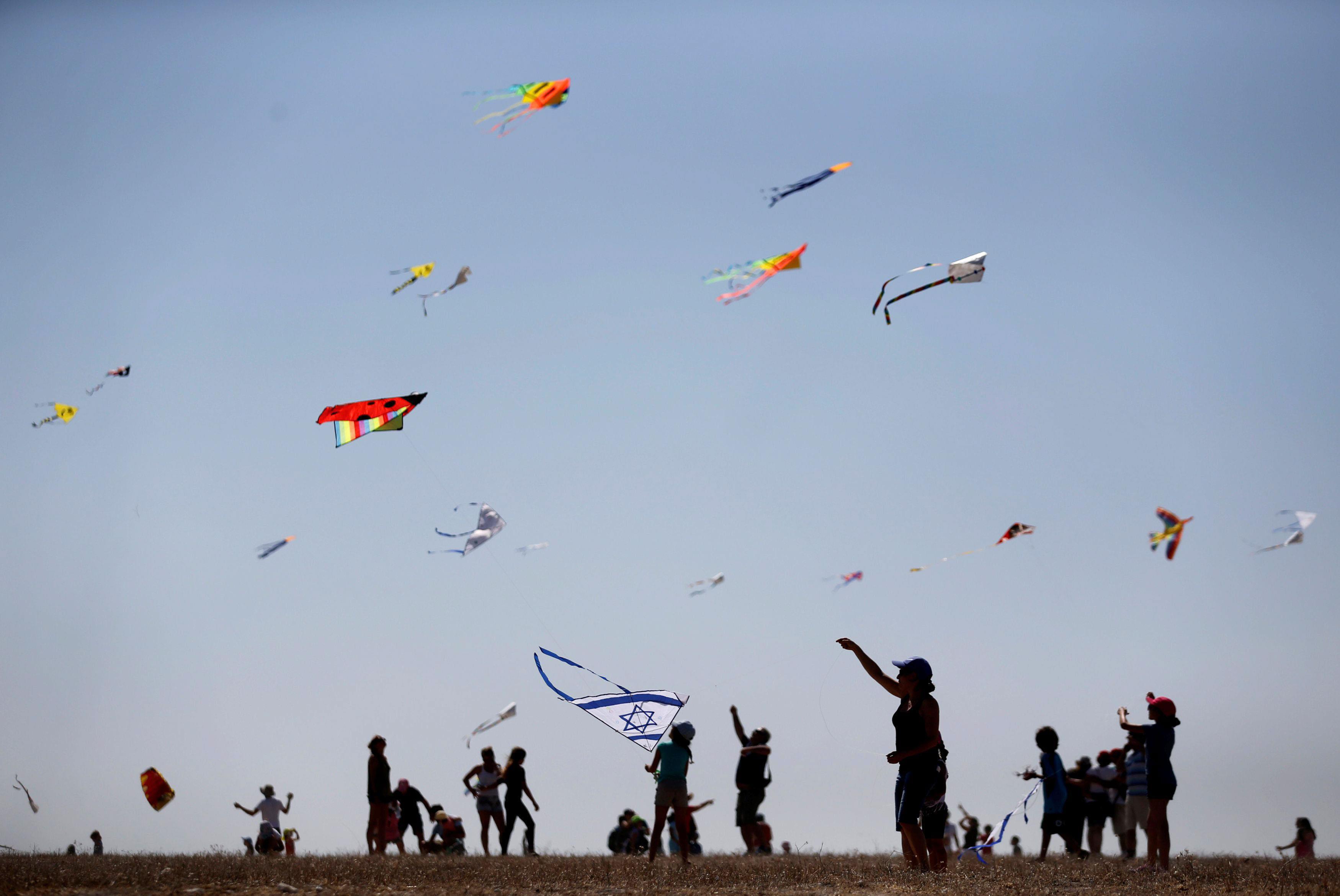 Israelis fly kites during Rosh Hashanah holiday, the first two days of the Jewish new year, in Beit 