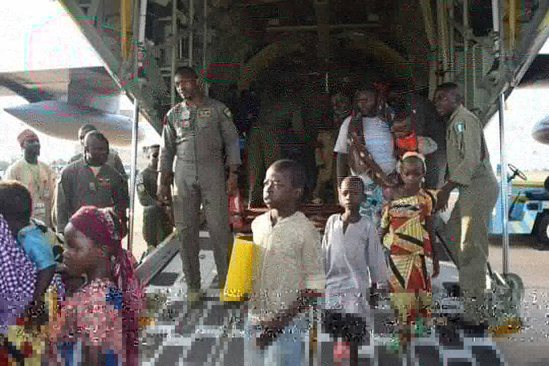 Minister receives 131 Nigerian refugees from Cameroon  [Twitter/@NigAirForce]