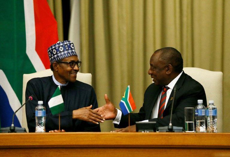 Buhari (left) and Ramaphosa (right) agreed to strengthen relations between Nigeria and South Africa during a meeting on Thursday, October 3, 2019 [AFP]