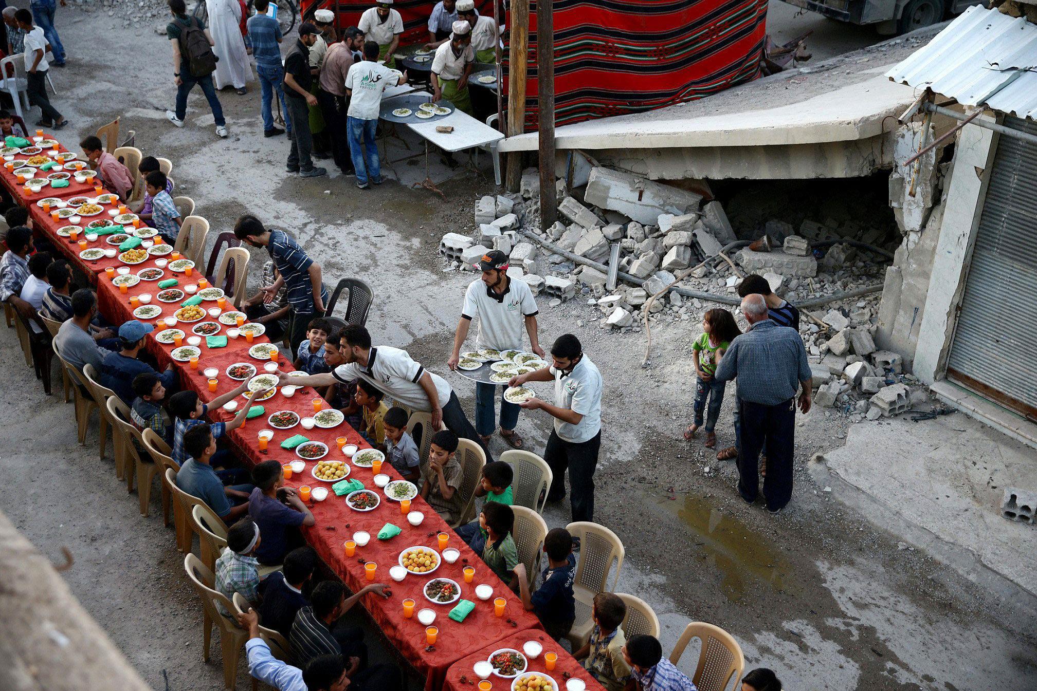 A Picture and its Story: Iftar amidst the ruins of Douma