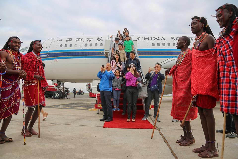 Traditional Kenyan Masaai dancers welcome Chinese tourists disembarking from a China Southern Airline plane at Jomo Kenyatta International Airport ( JKIA). (aviationtanzania.)