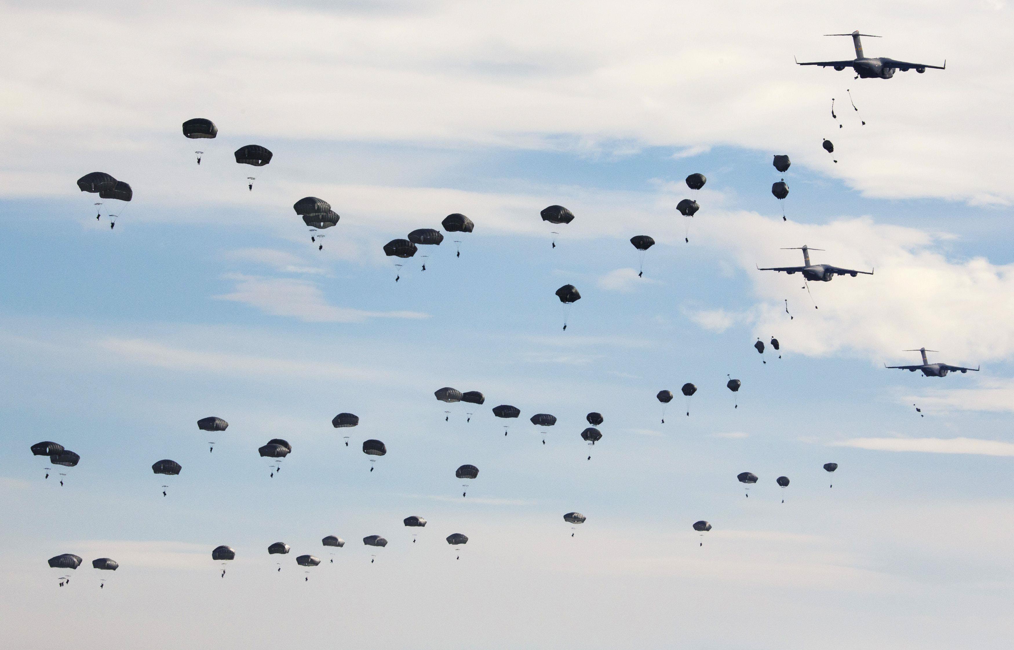 U.S. Paratroopers from the 82nd Airborne Division participate in a massive airdrop from C-17 Globema