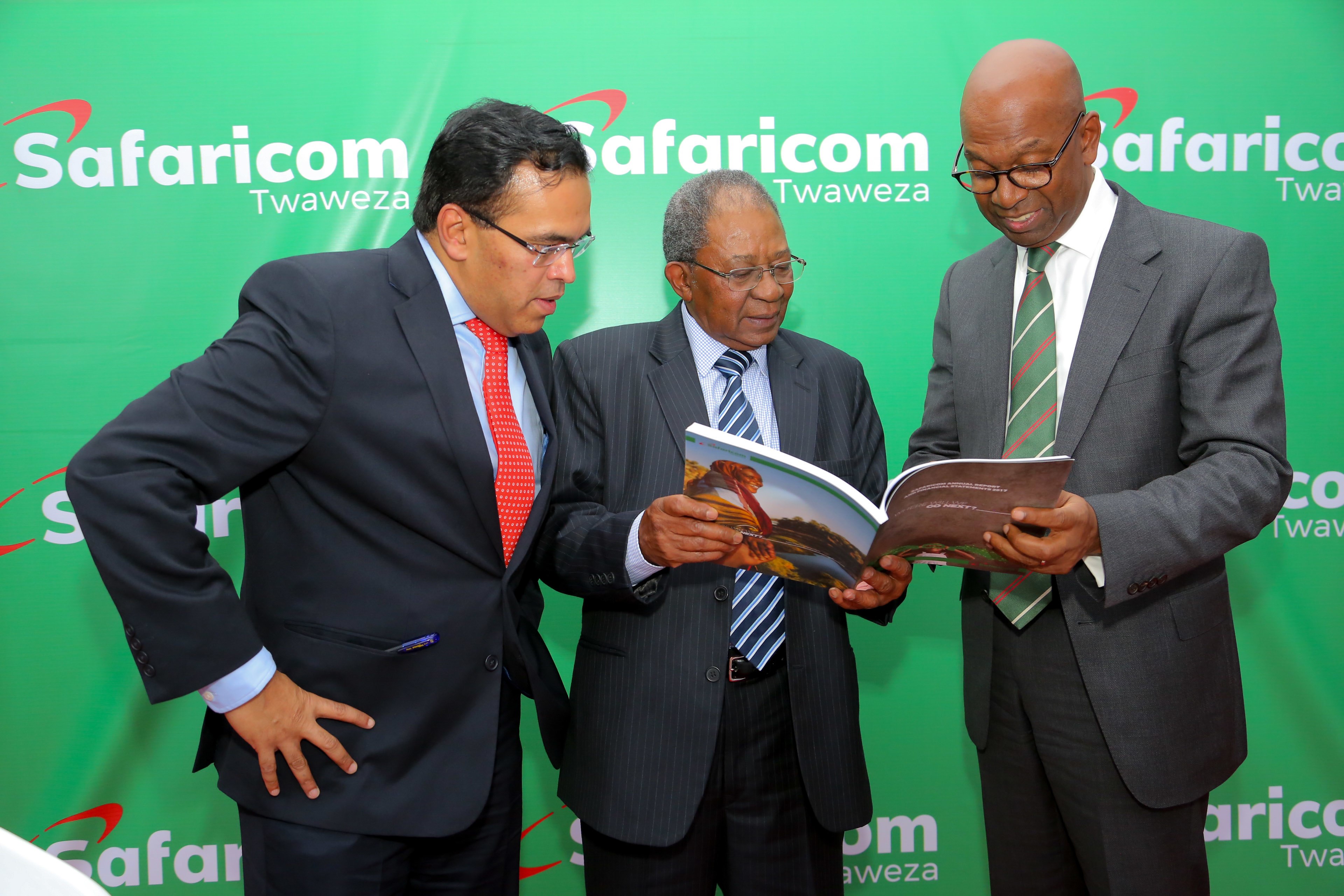 Safaricom Chief Financial Officer Sateesh Kamath (left), Safaricom Board Chairman Mr. Nicholas Nganga and Safaricom Chief Executive Officer, Bob Collymore (right)