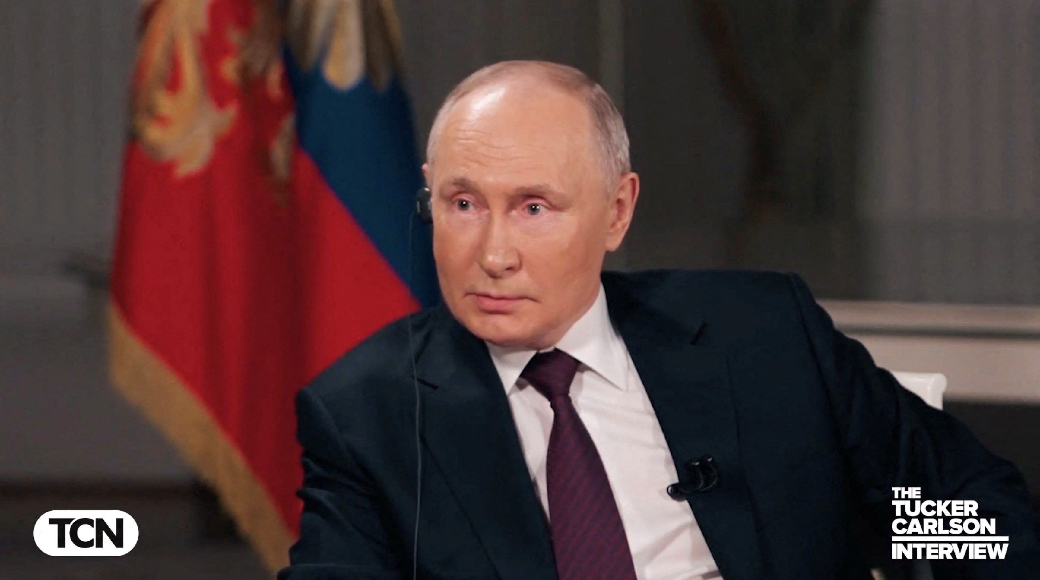 Władimir Putin w wywiadzie z Tuckerem Carlsonem.
