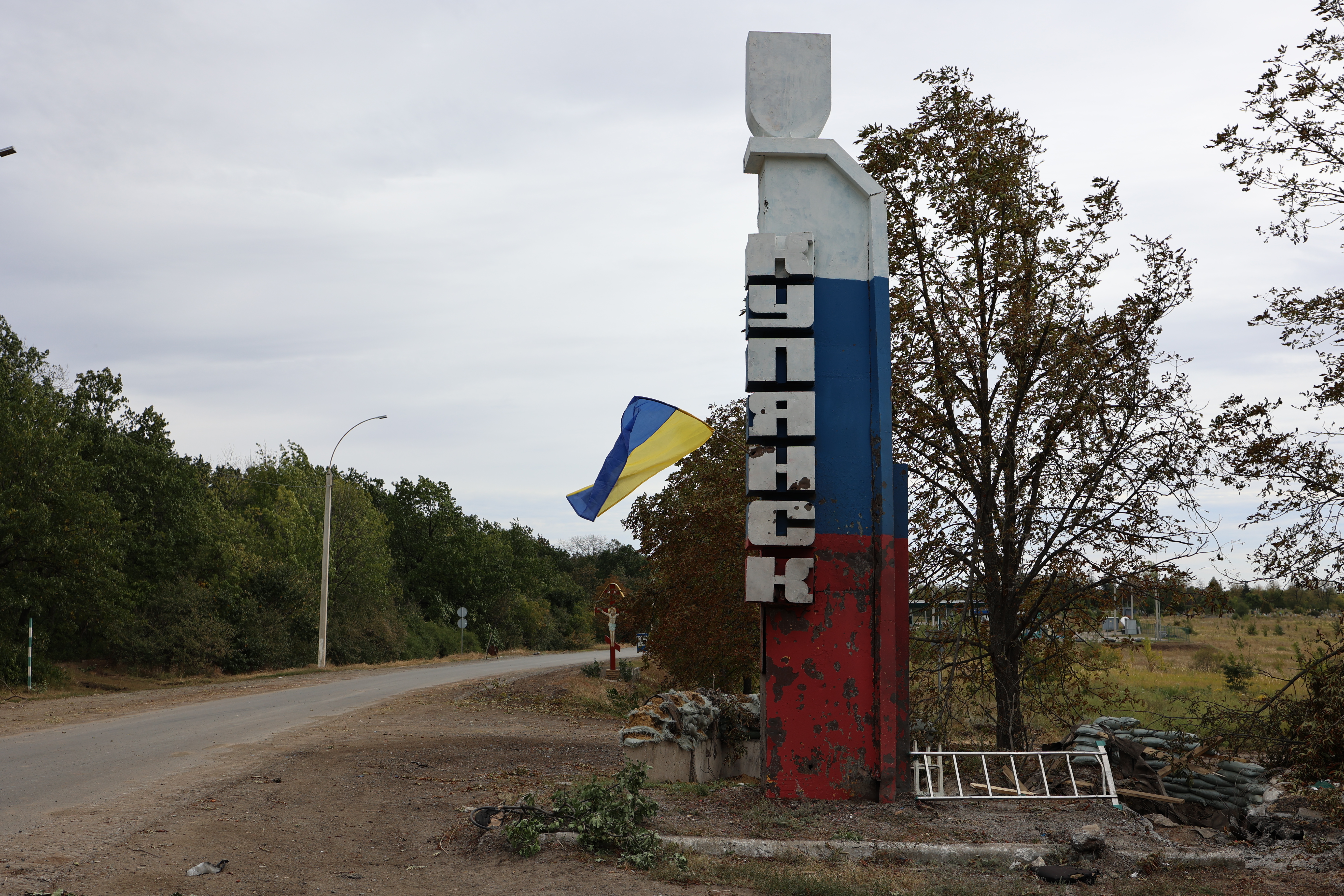 Znak witający wjeżdżających do odbitego przez Ukraińców Kupiańska