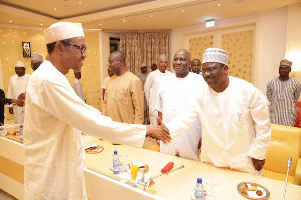 President Muhammadu Buhari exchanging handshake with Senator Mohammed Ali Ndume [Ndume.net] 