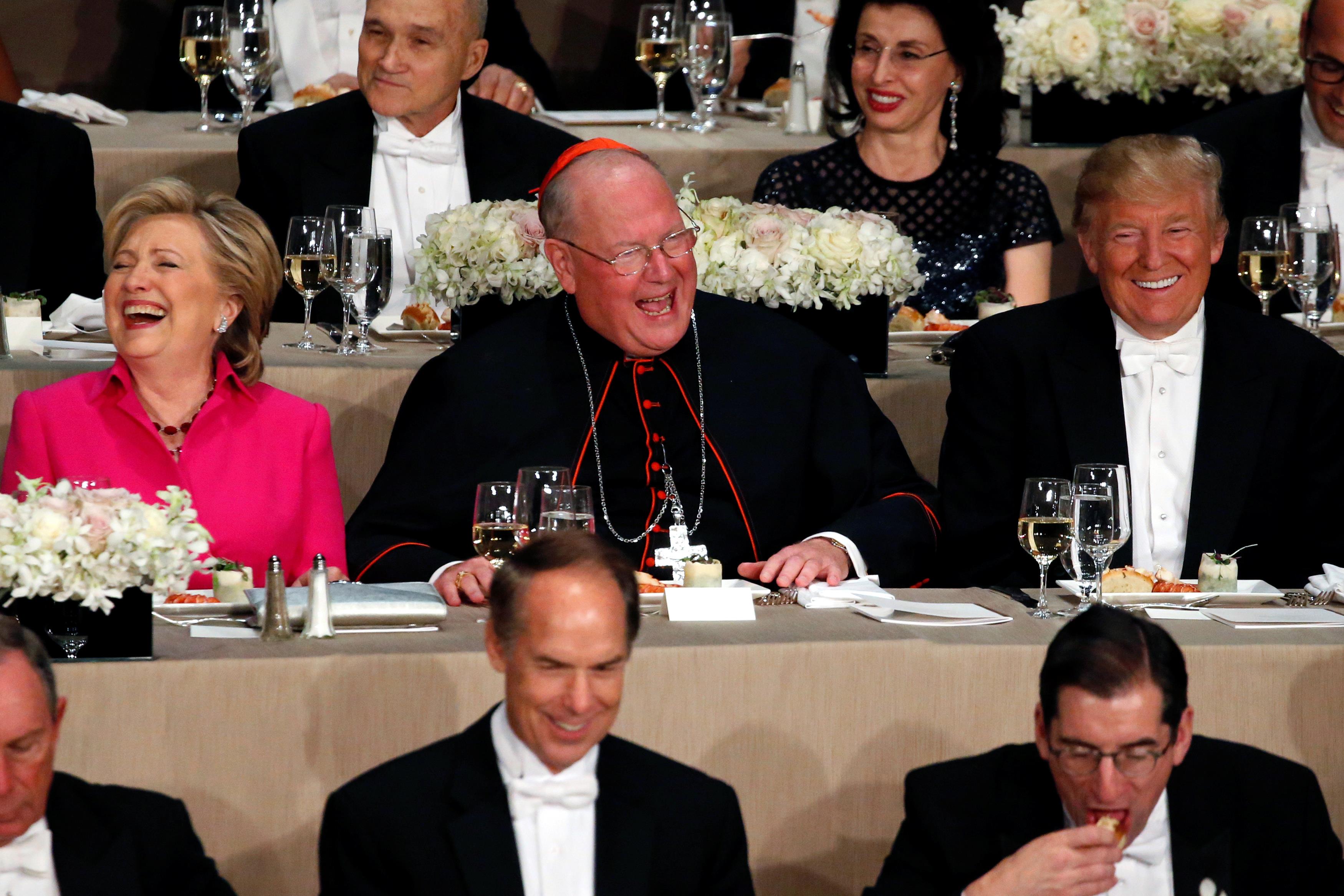 Clinton, Dolan and Trump sit together at the Alfred E. Smith Memorial Foundation dinner in New York