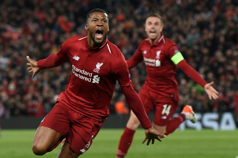 Georginio Wijnaldum and Jordan Henderson celebrating the former's dramatic goal in the Champions League tie against Barcelona