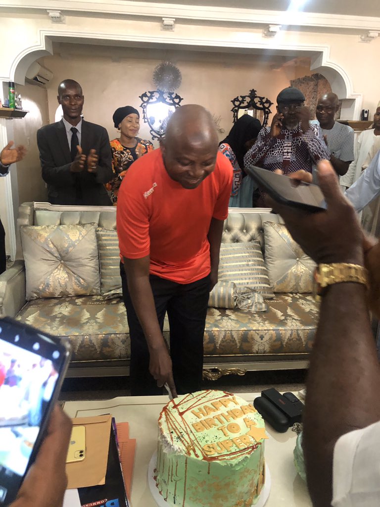 Senior Special Assistant on Media and Publicity to President Muhammadu Buhari, Malam Garba Shehu cuts his birthday cake. [Twitter/@GarShehu] 