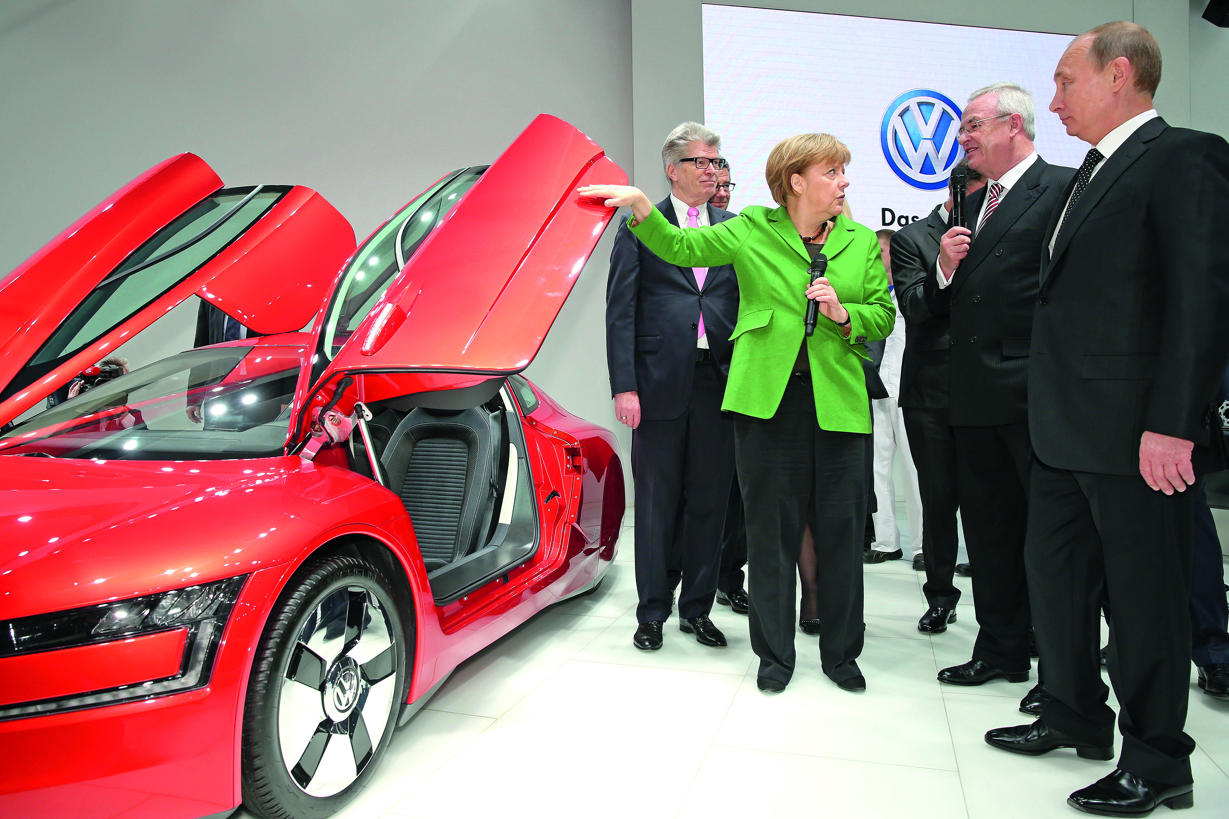 Angela Merkel, Władimir Putin i szef Volkswagena Martin Winterkorn