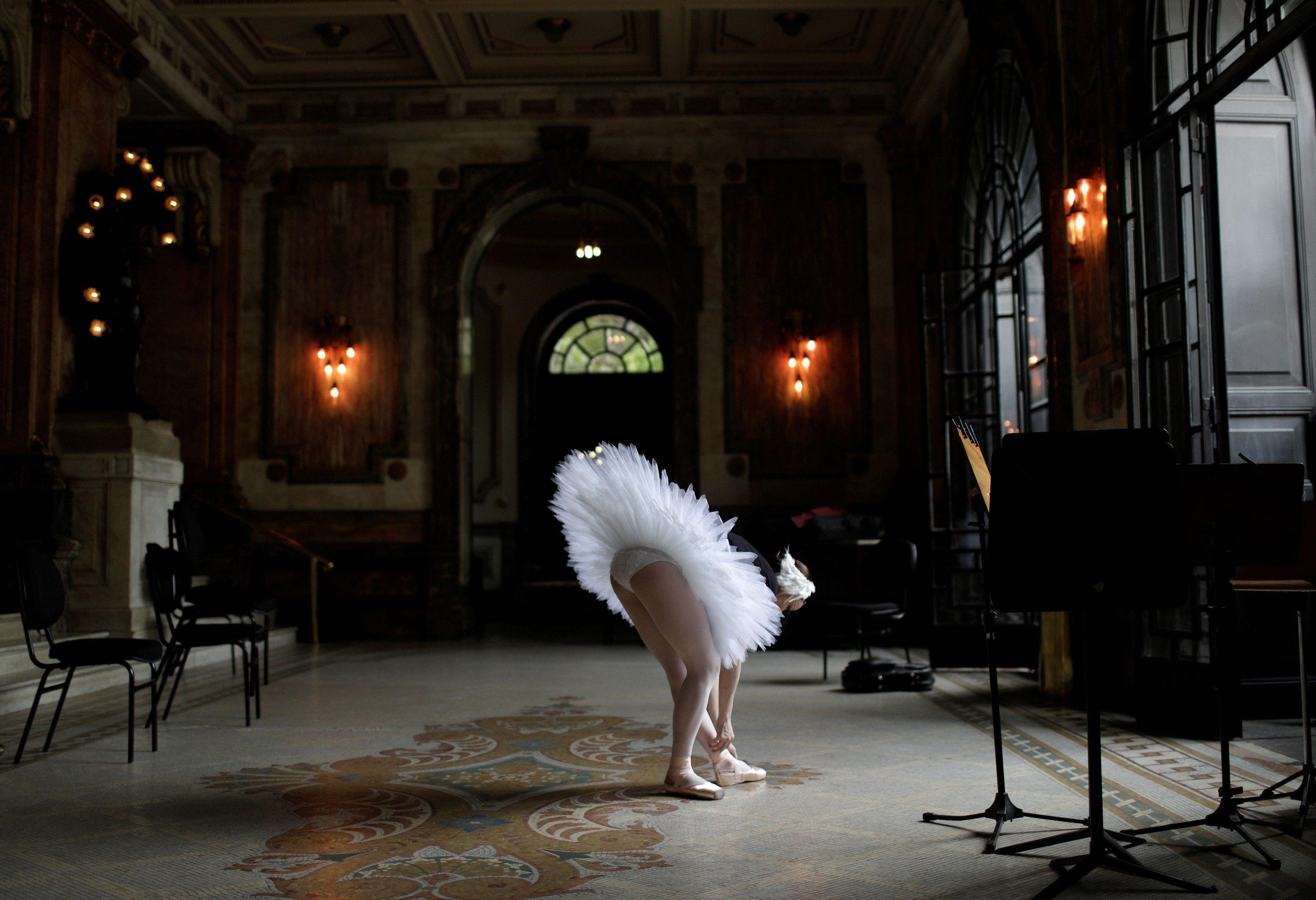 Prima ballerina Deborah Ribeiro, soloist of the Rio De Janeiro's Municipal Theatre, gets ready prior