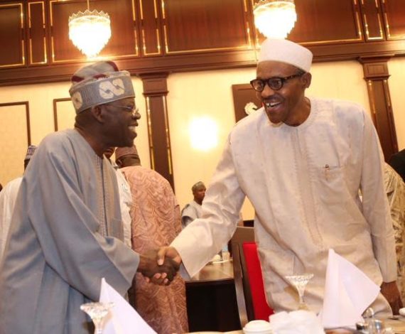 President Buhari and Bola Tinubu exchange pleasantries at the Villa on July 14, where the President hosted APC members.