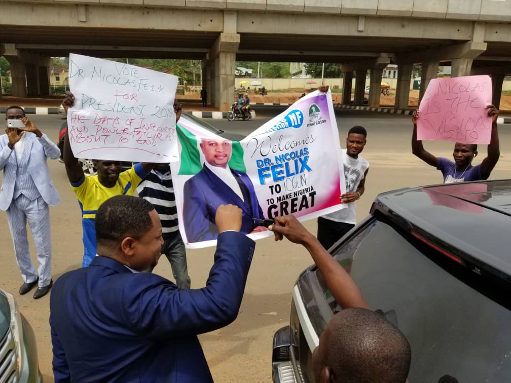 Dr Nicolas Felix surrounded by supporters during the campaign for the 2019 presidential election