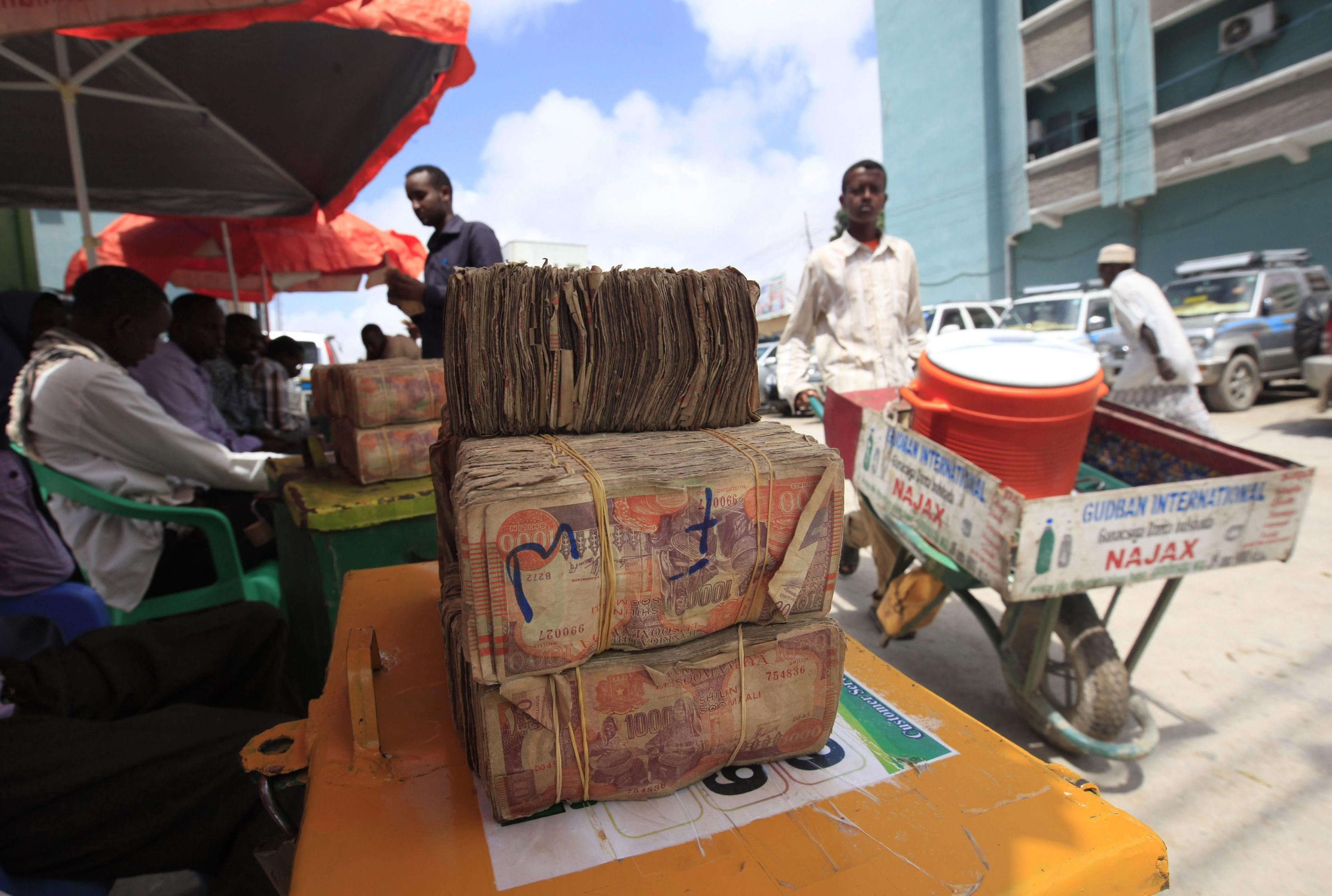 Somali shillings are seen at a foreign exchange bureau at Bakara market in Mogadishu October 8, 2013