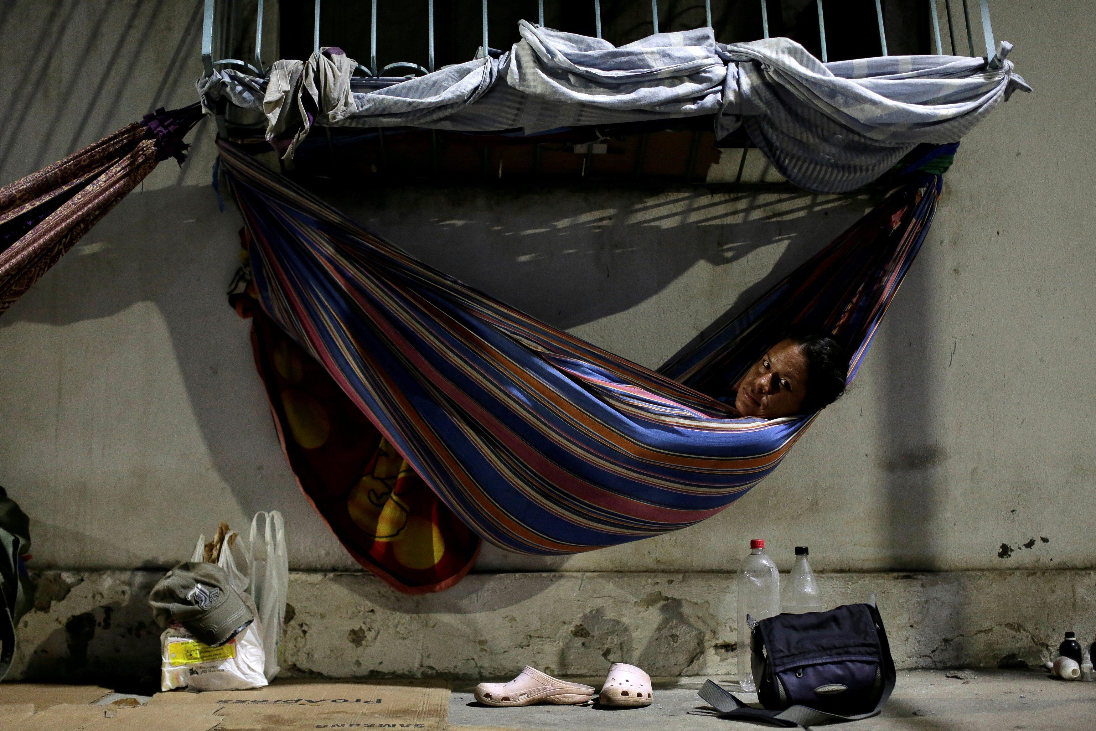 Venezuelan refugee Gabriela Martinez, who worked as a telecommunications engineer, relaxes in a hamm