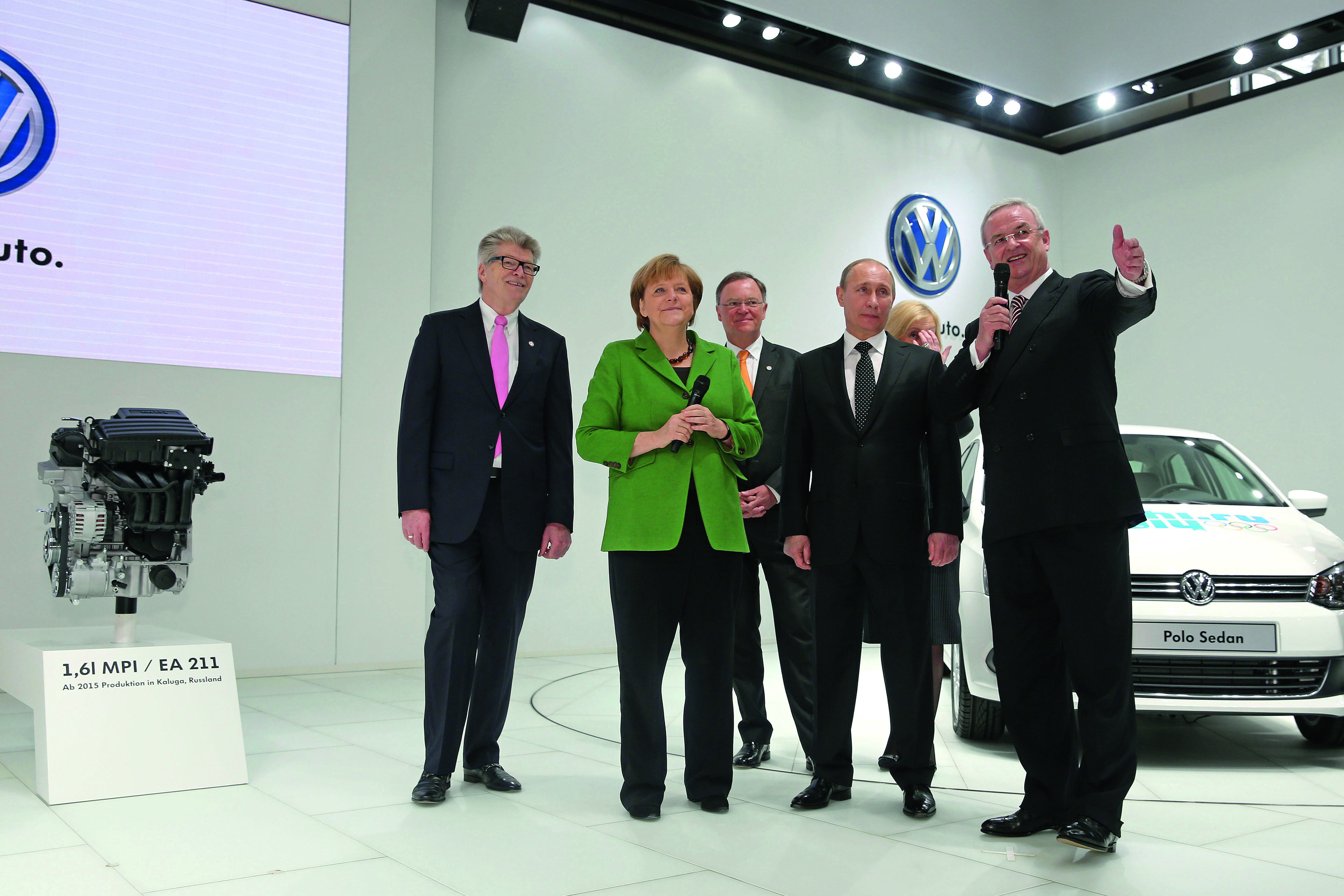Angela Merkel, Władimir Putin i szef VW Martin Winterkorn