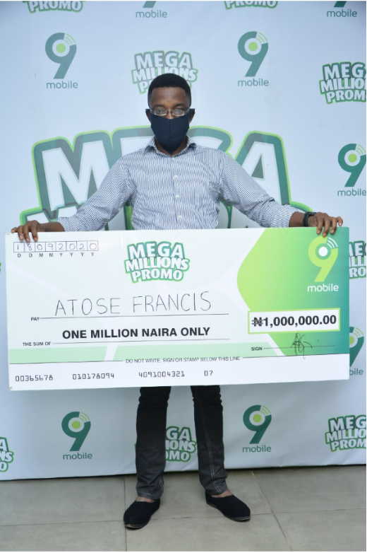 Atose Francis, N1million winner at the ongoing 9mobile Mega Millions Promo prize presentation in Ibadan.