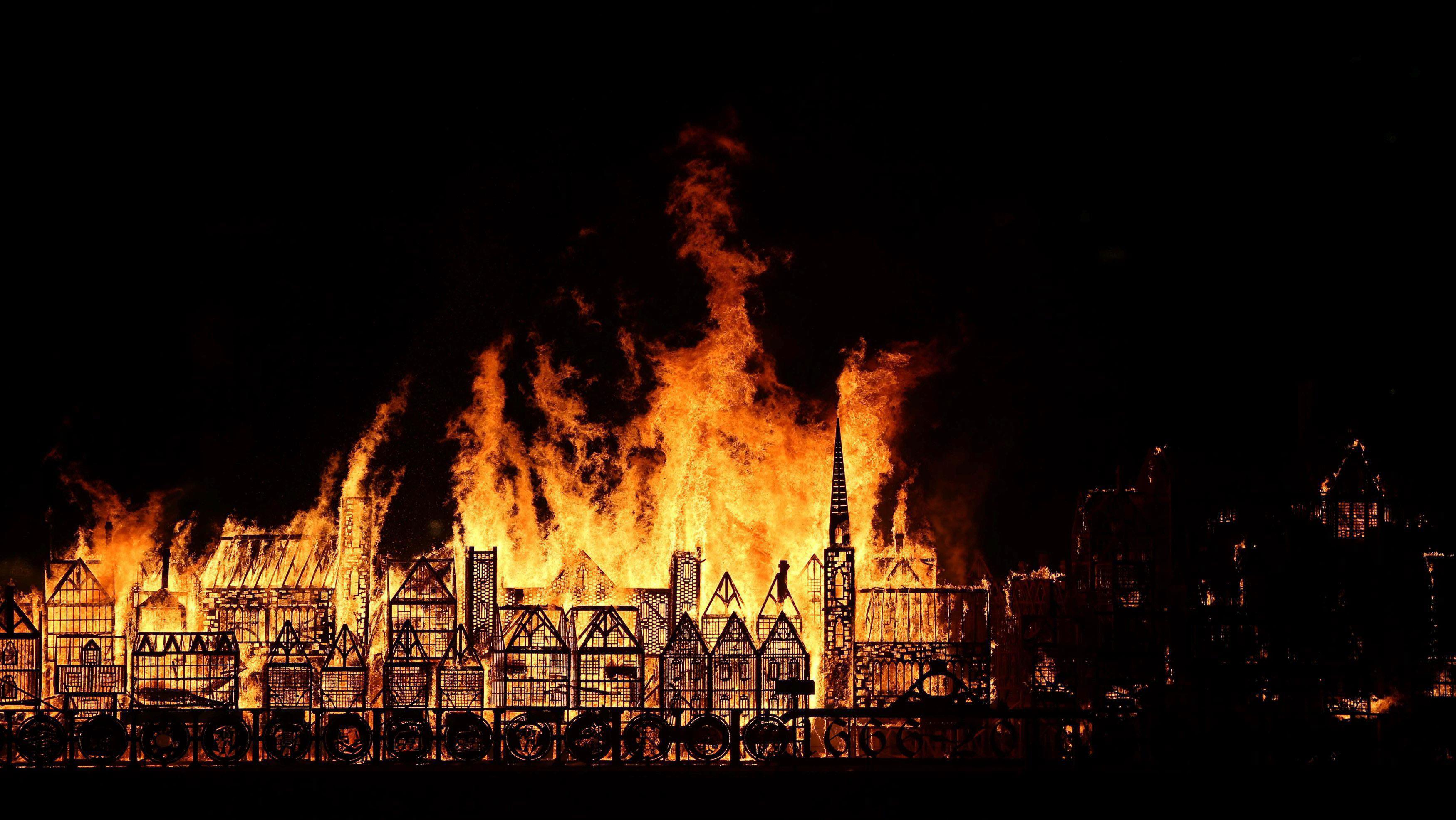A 120-meter long model of the 17th century London skyline is set alight on the River Thames to comme