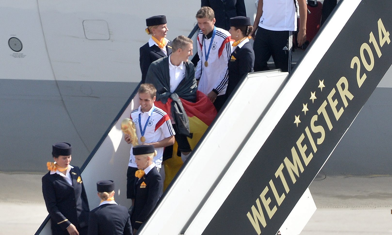 Mistrzowie świata wychodzą z samolotu