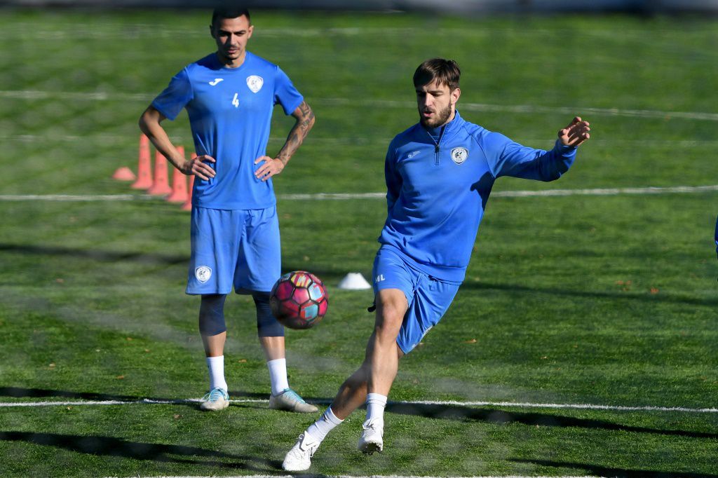Serbians and Albanians kick aside differences on football pitch