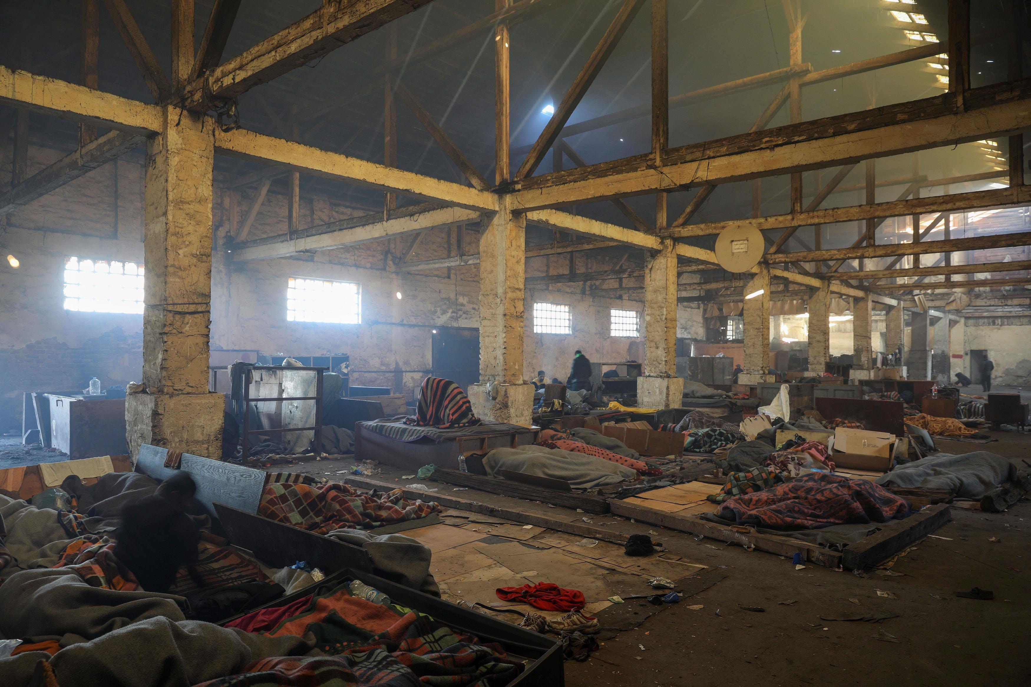 The Wider Image: Trapped in Serbia, migrants shelter in warehouse