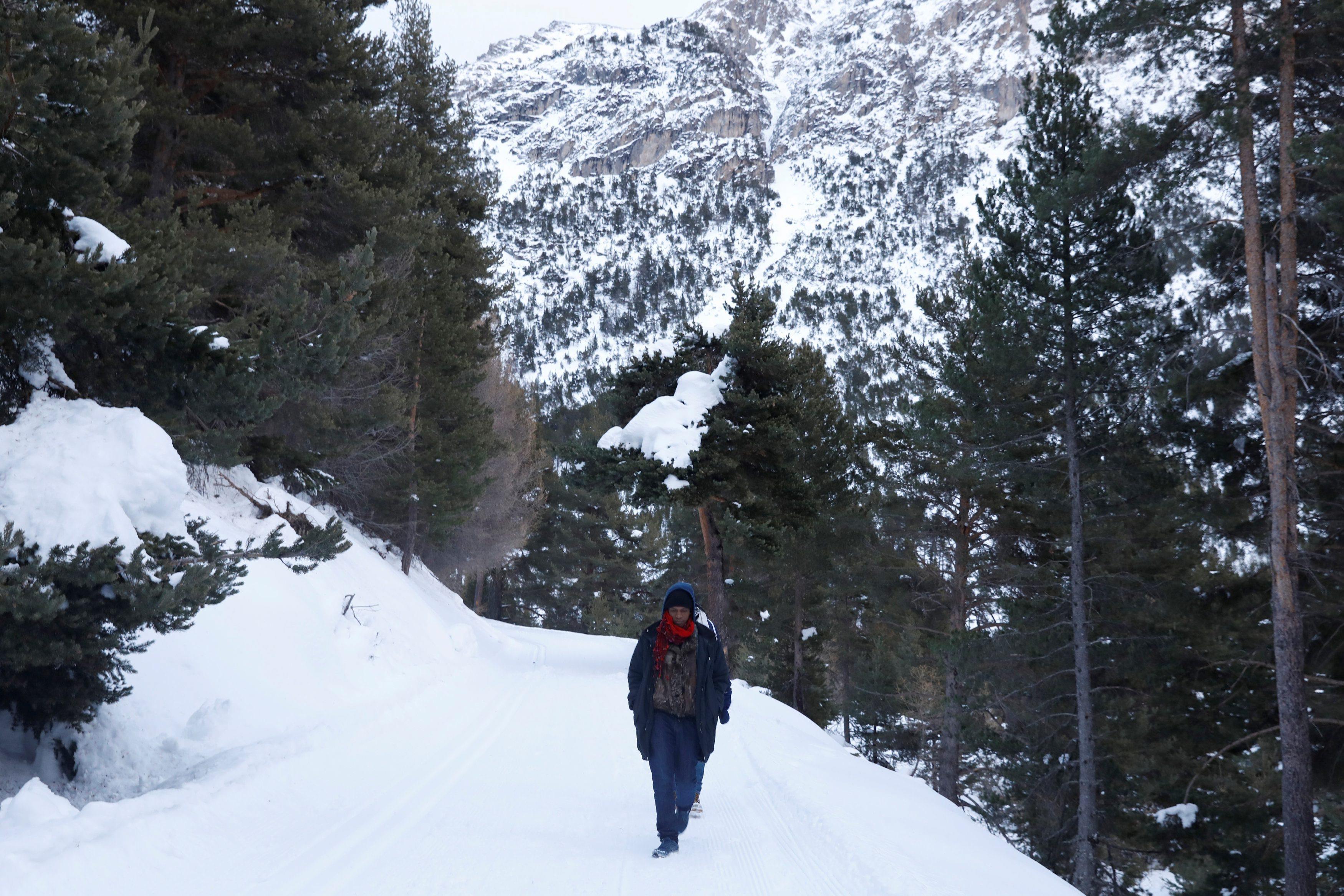 The Wider Image: Migrants risk death crossing Alps to reach France