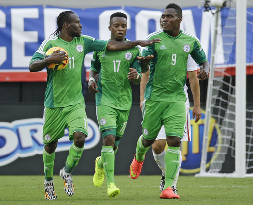 Victor Moses (left) also played with Emmanuel Emenike (right) with the Super Eagles for several years.