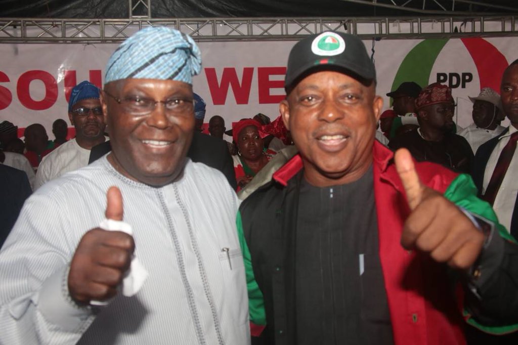 Atiku Abubakar with PDP chairman, Uche Secondus