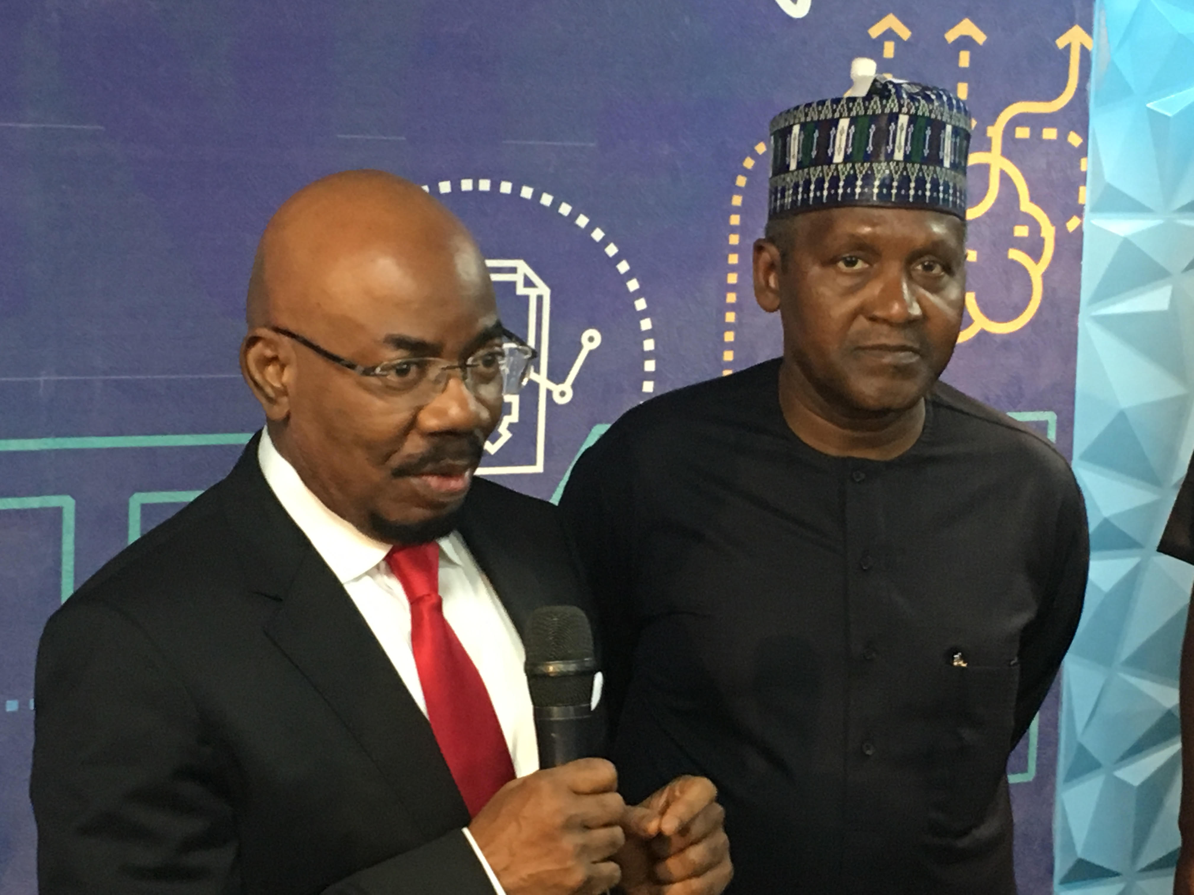 Aliko Dangote and JIm Ovia at the launching of KPMG Insights Centre in Lagos