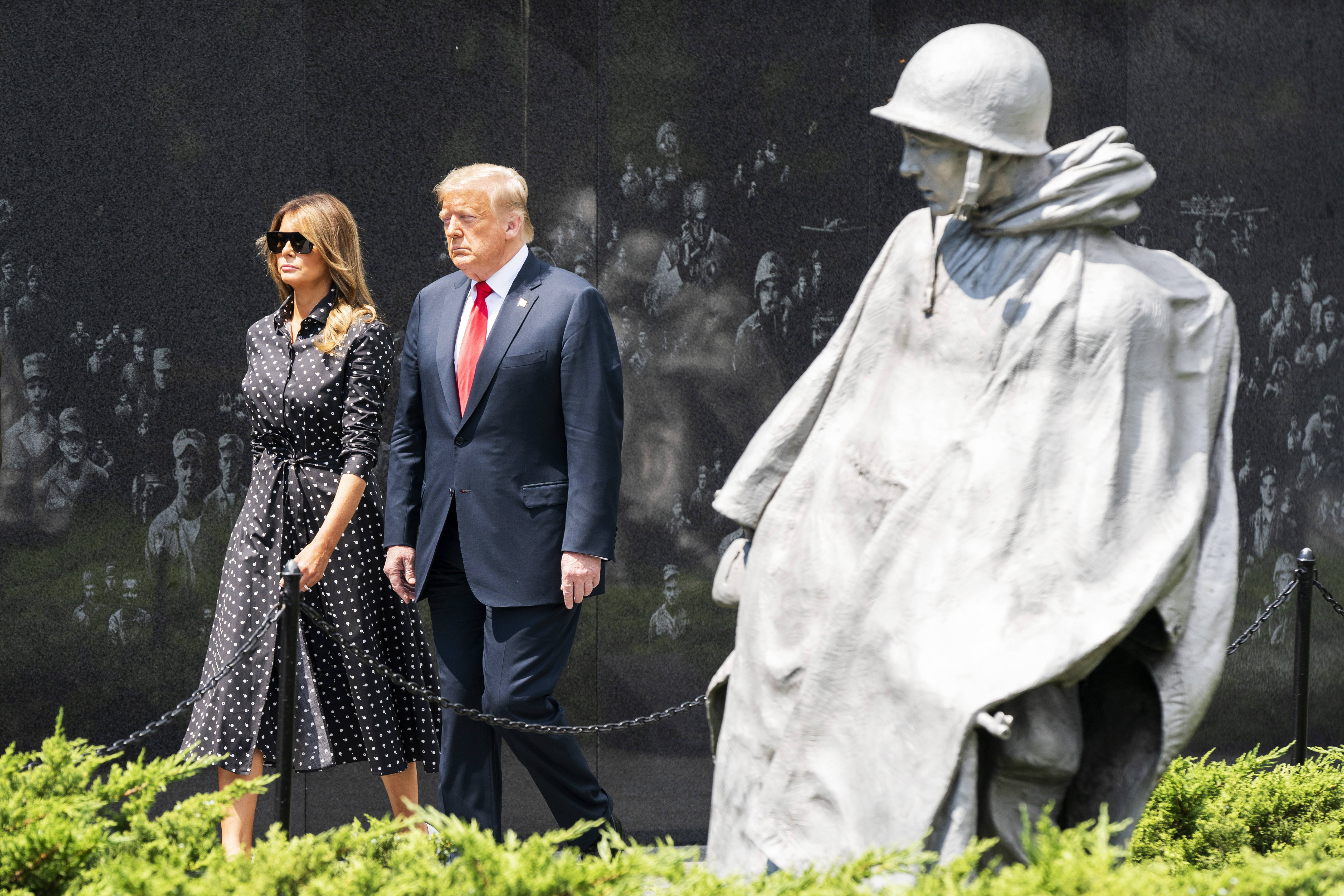 US President Donald J. Trump, alongside First Lady Melania Trump, tours the Korean War Veterans Memorial in Washington, DC, USA, 25 June 2020.