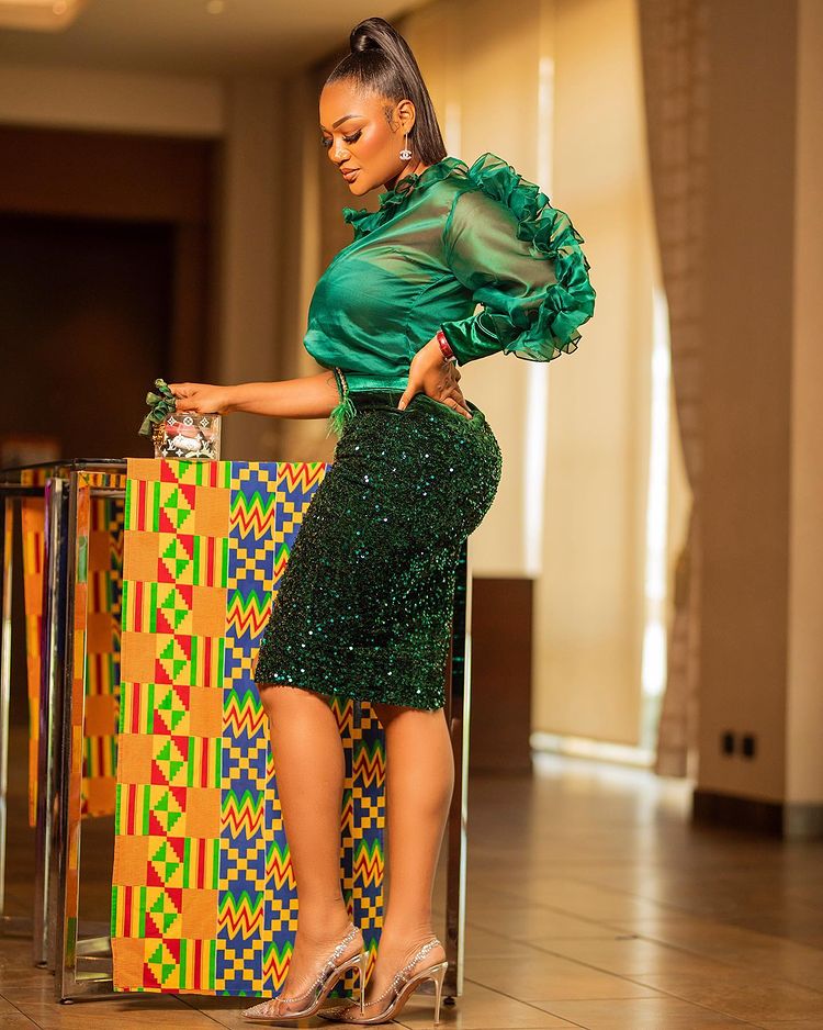 Style inspiration: Sandra Ankobiah struts in a green sequin outfit like a real model