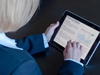 Female accountant with digital tablet