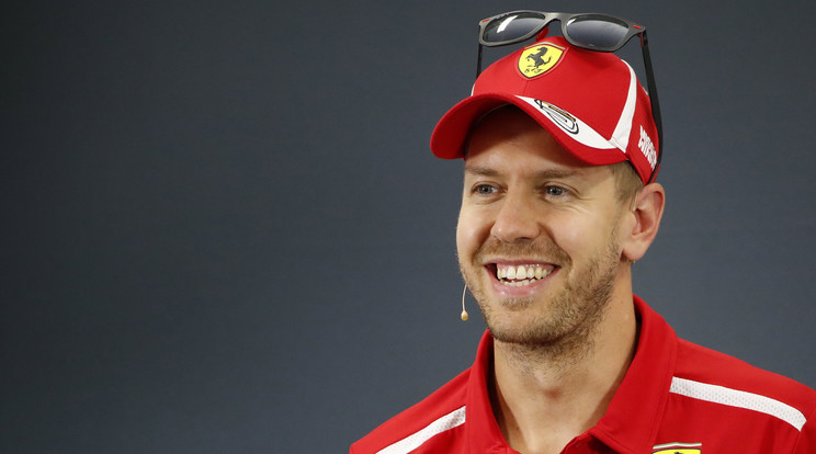 Vettel megható reakciója futamgyőzelme után / Fotó: MTI/EPA Frank Robichon