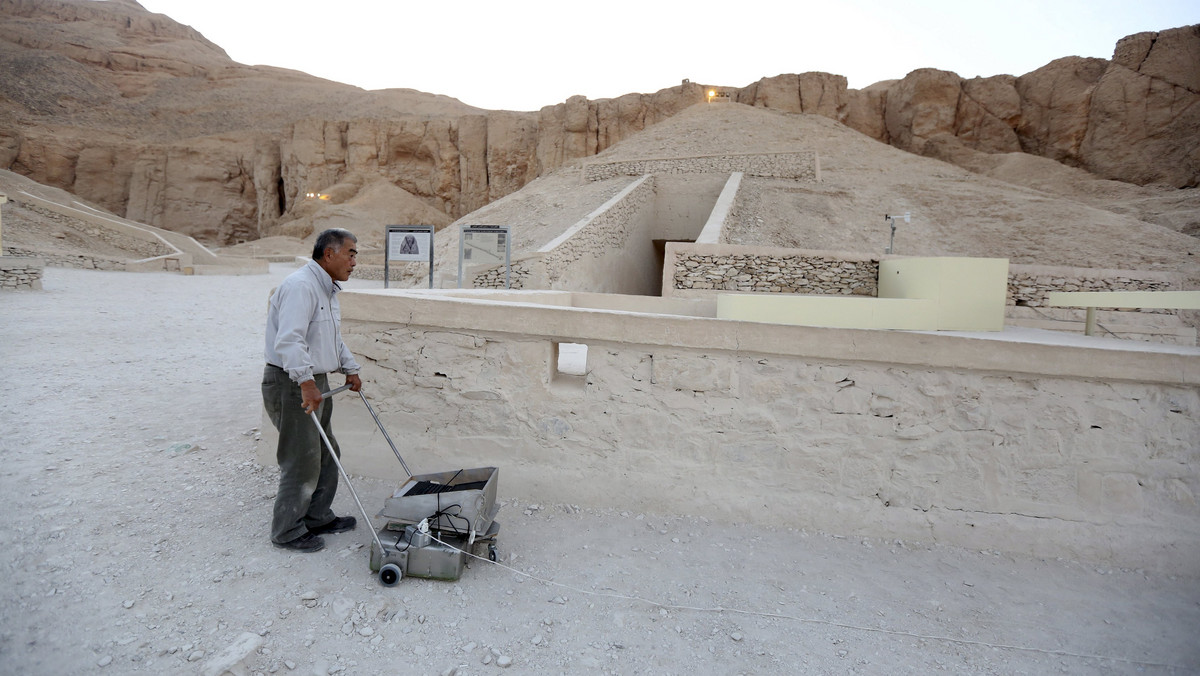 File photo shows a Japanese radar specialist Hirokatsu Watanabe standing with his equipment outside King Tutankhamun's burial chamber in the Valley of Kings in Luxor, Egypt