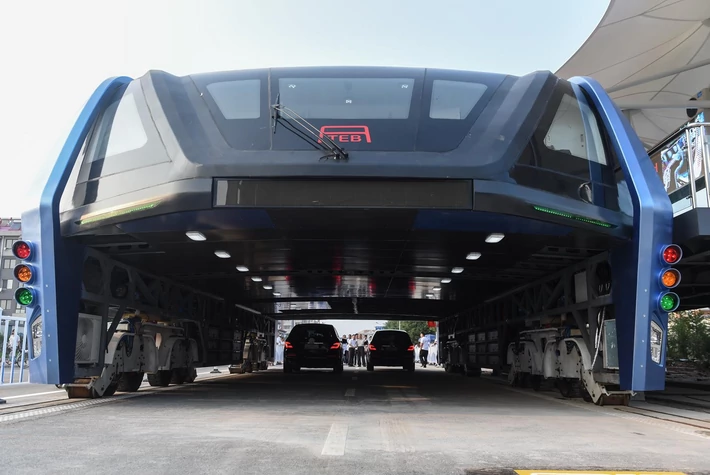 China's Elevated Bus Hits The Road