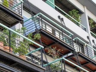 Kozzi-apartment_building_with_balconies-883x588