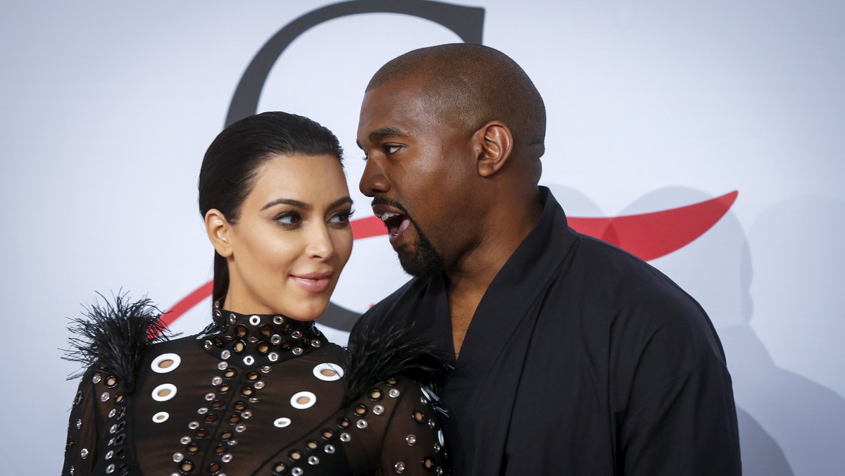 Kim Kardashian arrives with Kanye West to attend the 2015 CFDA Fashion Awards in New York