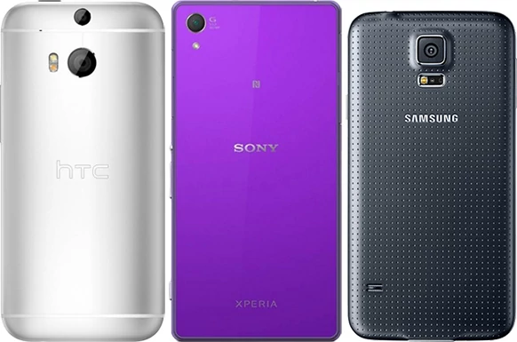 Nasi trzej bohaterowie w tej samej skali. Samsung Galaxy S5 jest najkrótszy, a HTC One – najwęższy