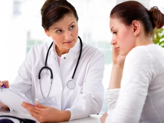 doctor with female patient