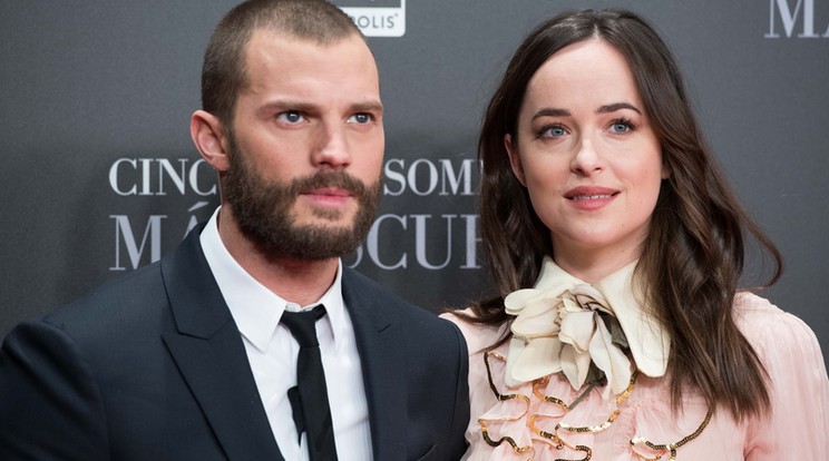 Jamie Dornan és Dakota Johnson, a Szavadság ötven árnyalata két főszereplője /Fotó: AFP