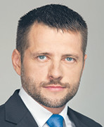 Łukasz Chruściel radca prawny, partner kierujący biurem Kancelarii Raczkowski Paruch w Katowicach