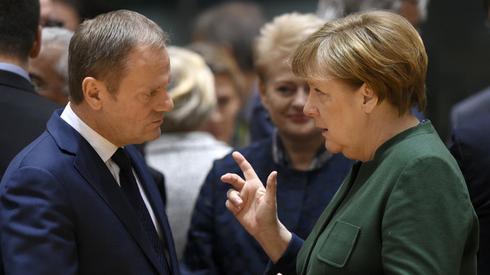 Donald Tusk i Angela Merkel /fot. AFP/ John Thys