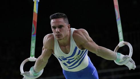 Eleftherios Petrounias, mistrz olimpijski w ćwiczeniach na kółkach (fot. AFP)