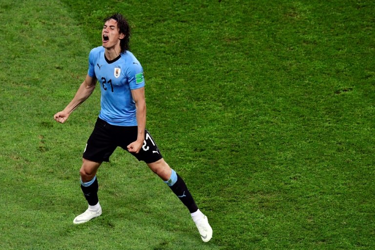 Cavani scored a brilliant double as Uruguay downed Portugal