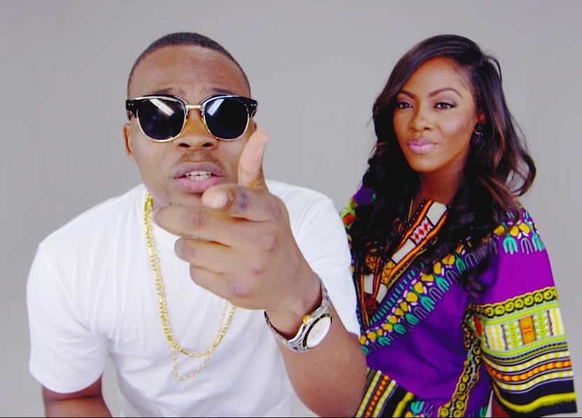 Tiwa Savage, Olamide Stars are playful in colourful 'Standing ovation' video