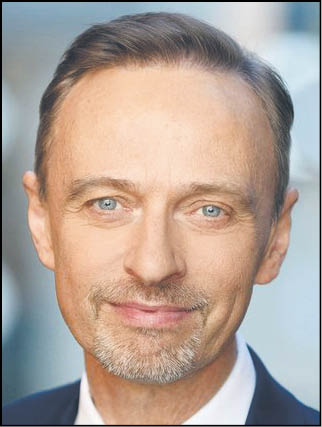 logo Tomasz Kowalski